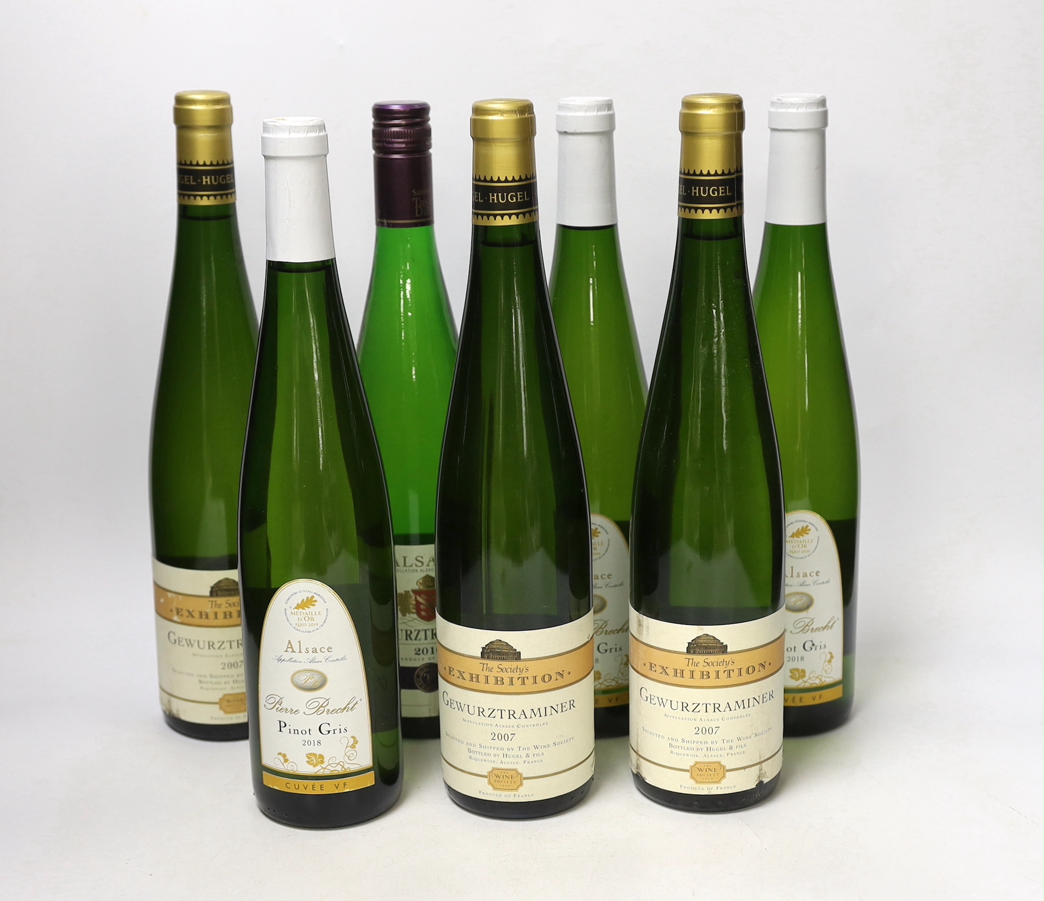 Seven bottles of white wine, Gewürztraminer and Pinot Gris